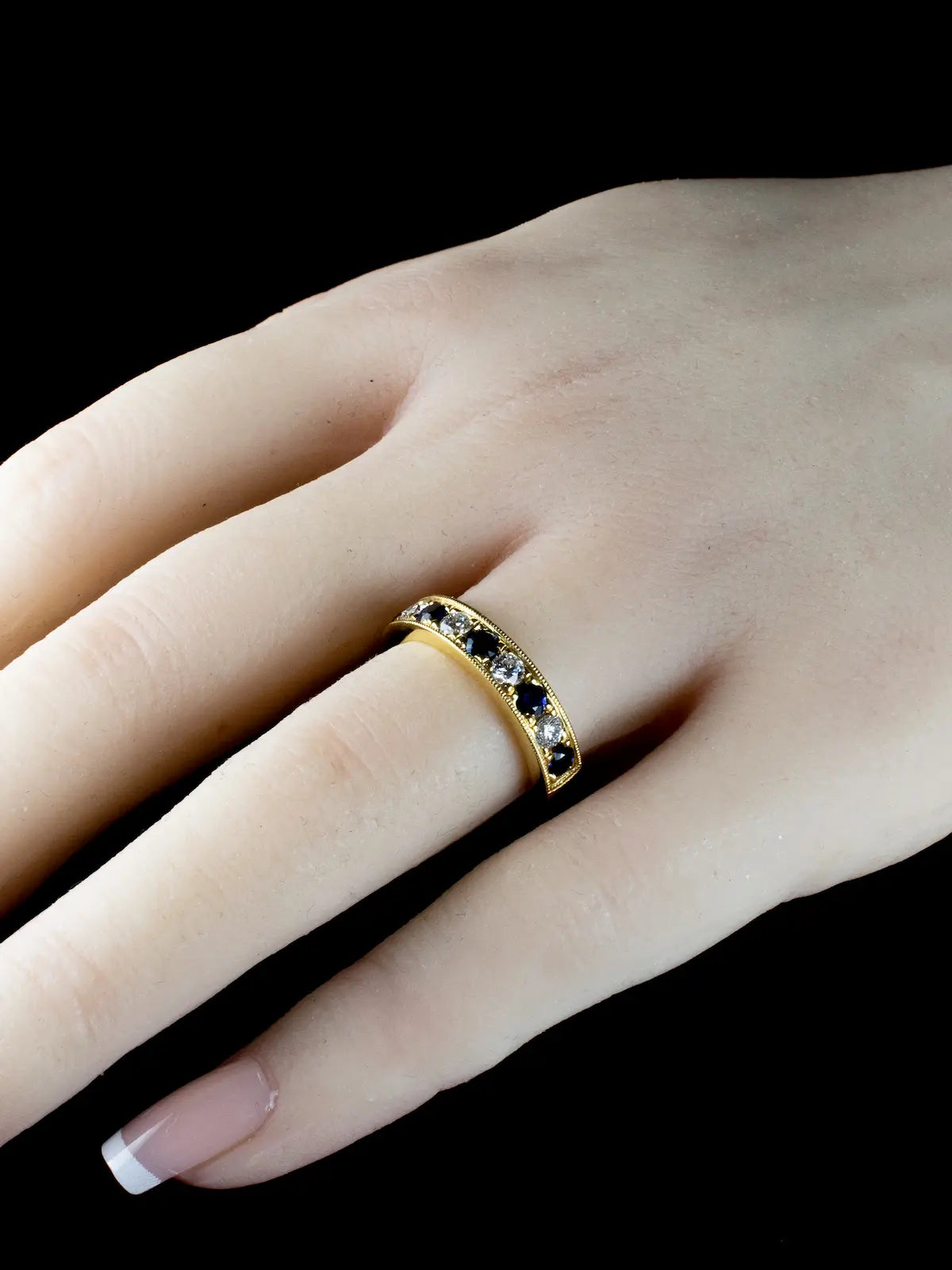 18ct Gold 0.75ct Sapphire and 0.43ct Diamond Half Eternity Ring