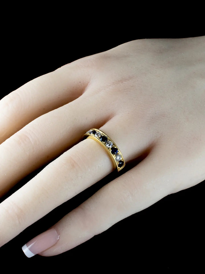 18ct Gold 0.75ct Sapphire and 0.43ct Diamond Half Eternity Ring
