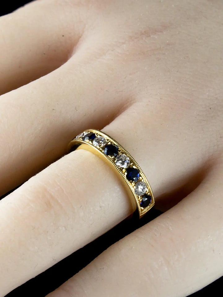 18ct Gold 0.75ct Sapphire and 0.43ct Diamond Half Eternity Ring