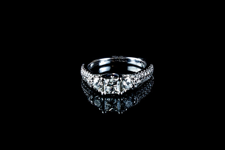 18ct Gold Vera Wang Three Stone Diamond Ring With Shoulder set Diamonds and Square Cut Sapphire