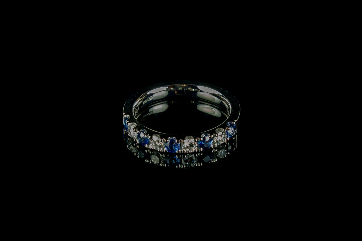 Platinum Sapphire and Diamond Nine Stone Half Eternity ring