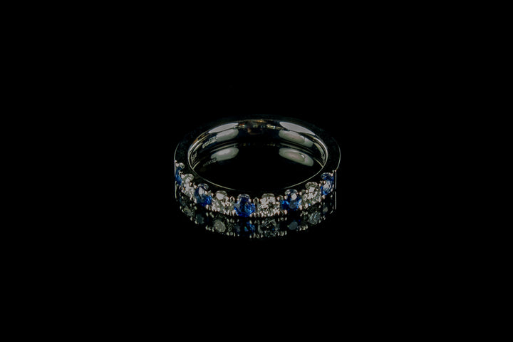Platinum Sapphire and Diamond Nine Stone Half Eternity ring