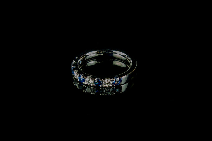 Platinum Sapphire and Diamond Nine Stone Half Eternity ring