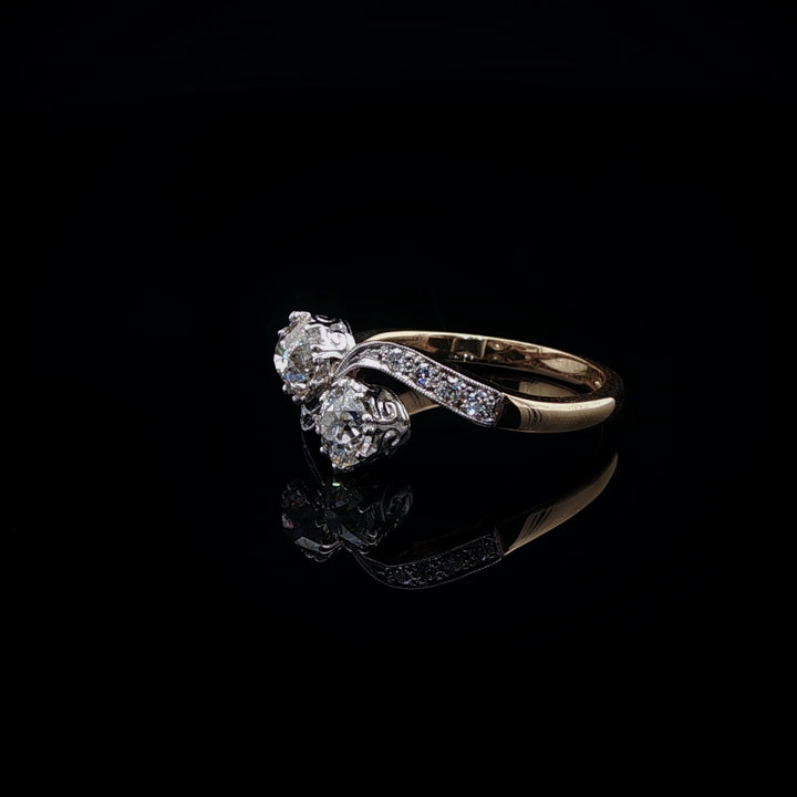 18ct Gold and Platinum Old Cut 1.02ct Diamond Toi et Moi Twist Ring