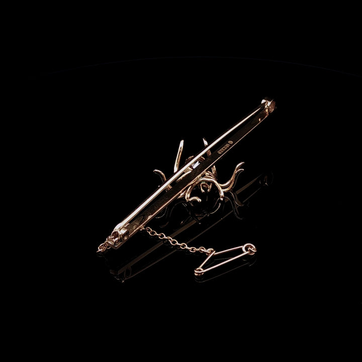 Art Deco 9ct Gold Spider Bar Brooch with Brown Zircon and Sapphire by Saunders & Shepherd, Circa 1930