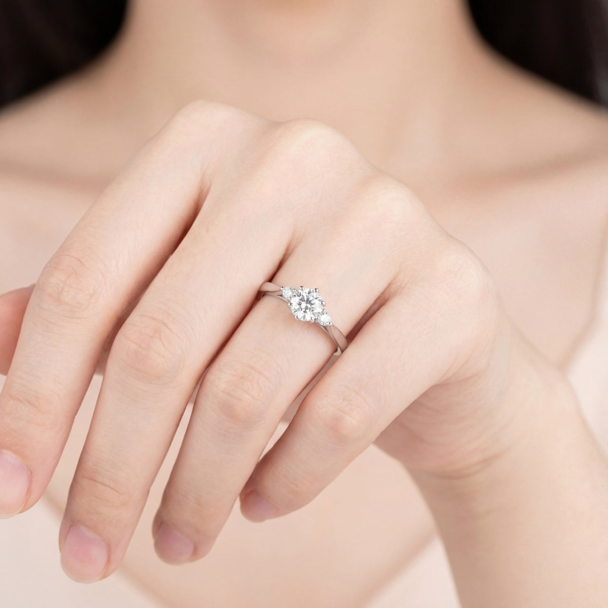 Platinum Three Stone Brilliant and Pear Cut Diamond Ring, 0.50ct
