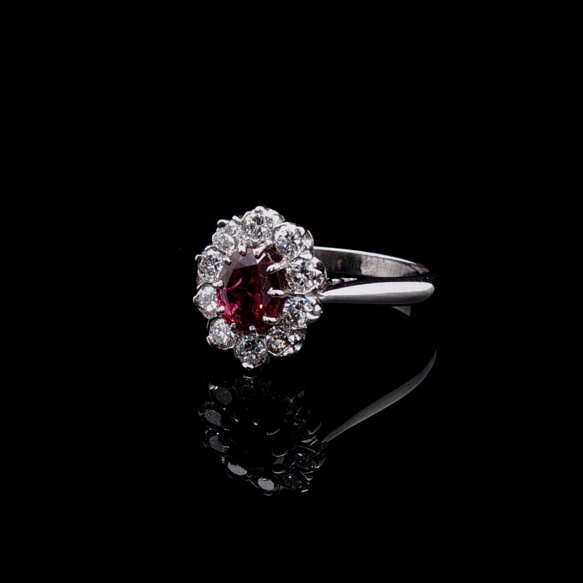 18ct Gold and Platinum Ruby and 0.50ct Diamond Cluster Ring