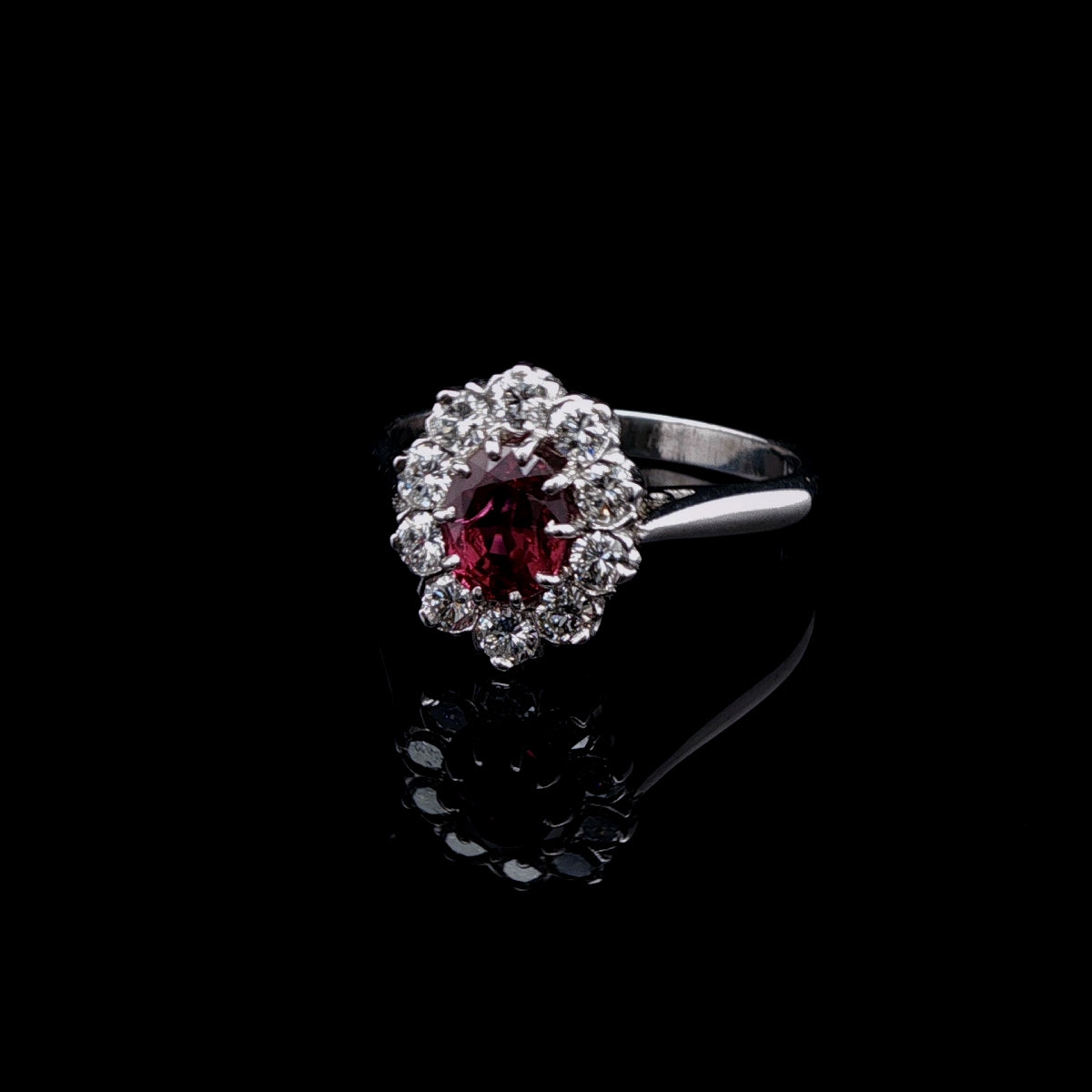 18ct Gold and Platinum Ruby and 0.50ct Diamond Cluster Ring