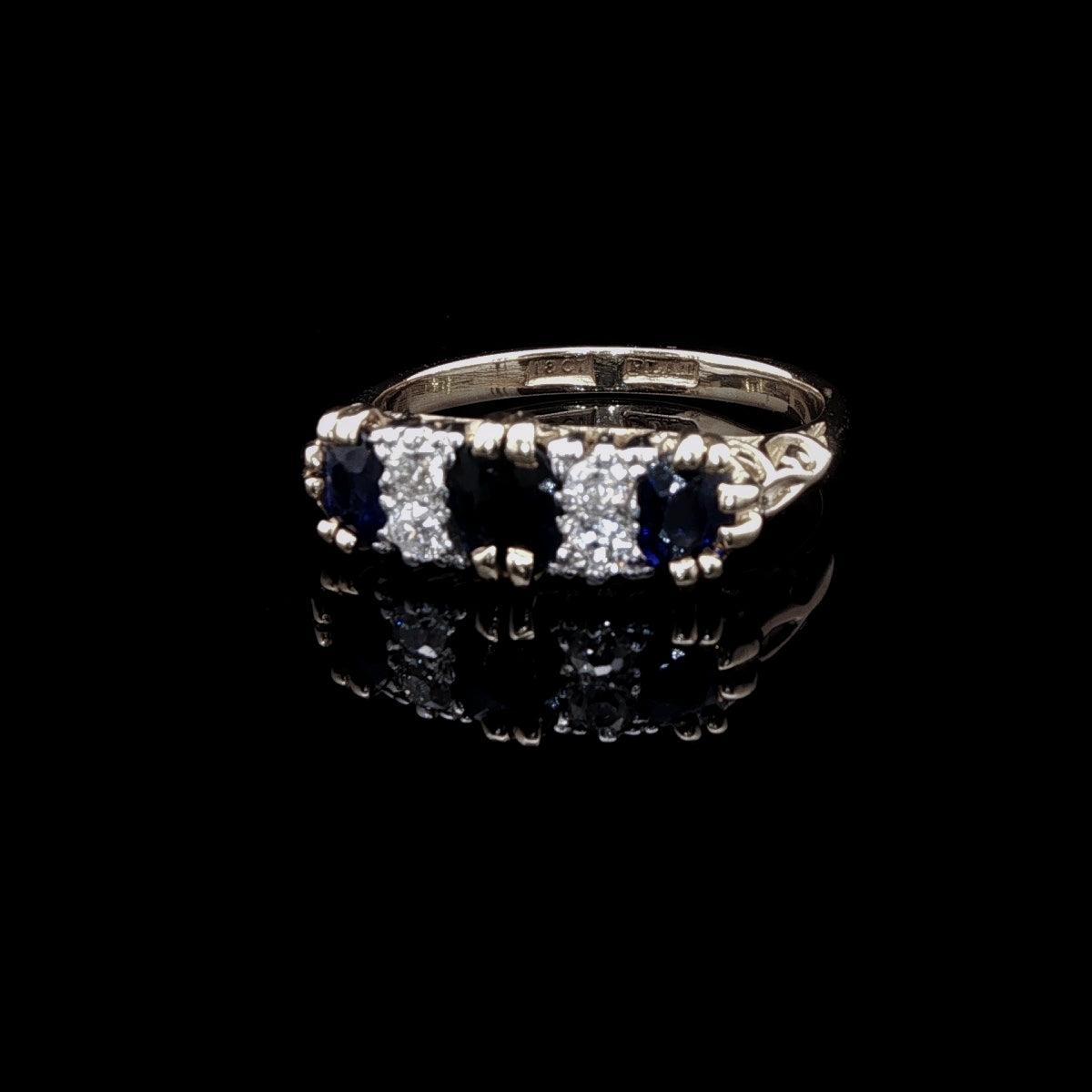 Vintage 18ct Gold and Platinum Seven Stone Sapphire and Diamond Ring with Carved Gallery