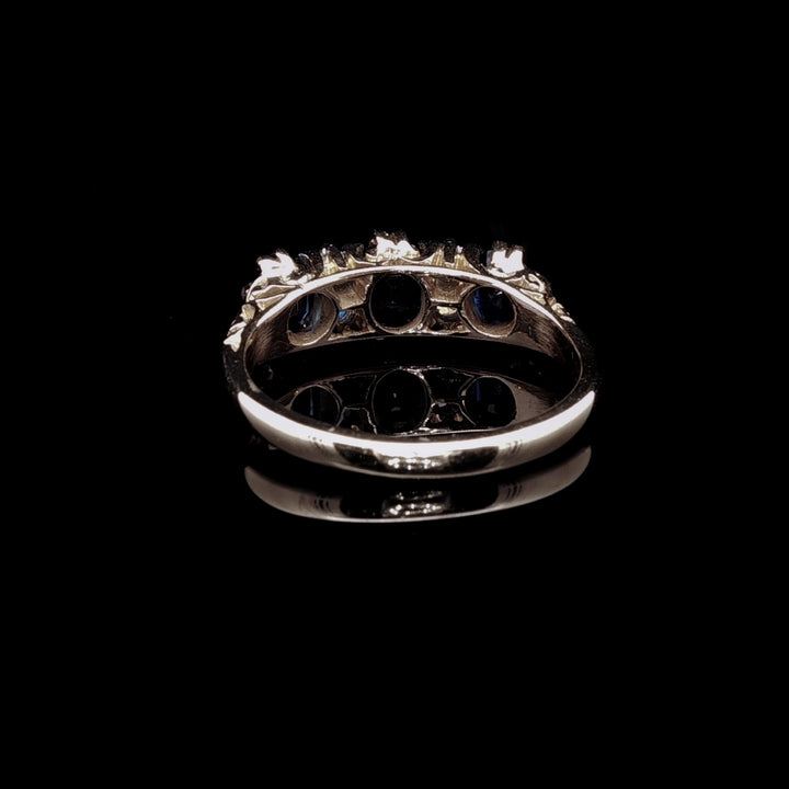 Vintage 18ct Gold and Platinum Seven Stone Sapphire and Diamond Ring with Carved Gallery