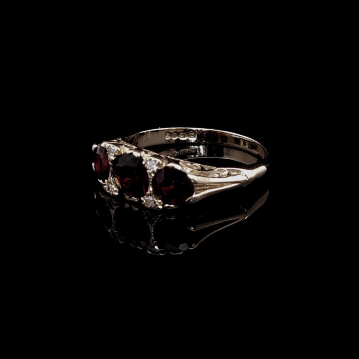 Antique 18ct Yellow Gold Seven Stone Garnet and Diamond Ring with Carved Gallery