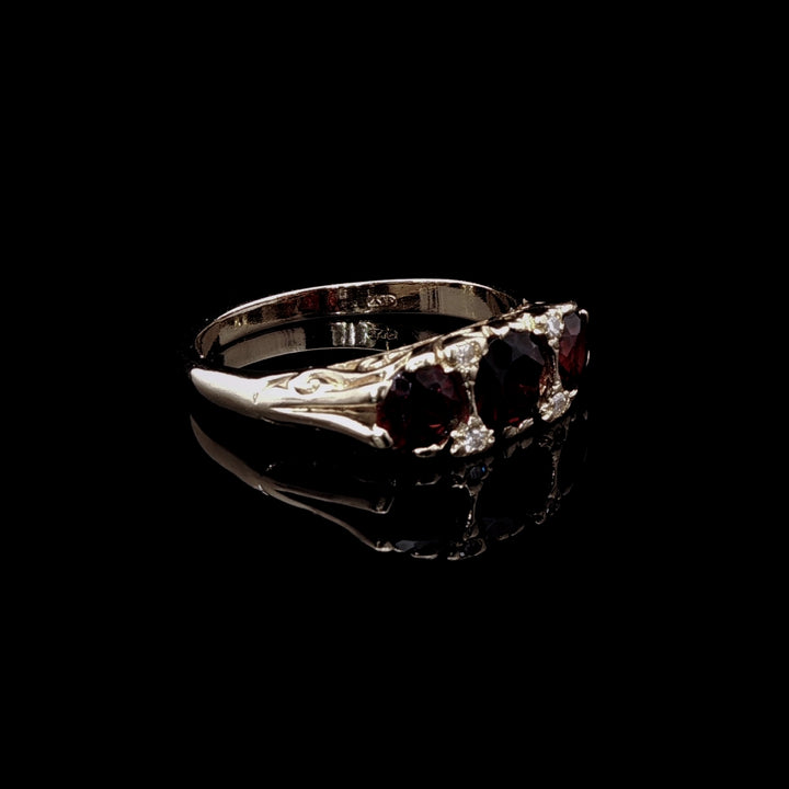Antique 18ct Yellow Gold Seven Stone Garnet and Diamond Ring with Carved Gallery