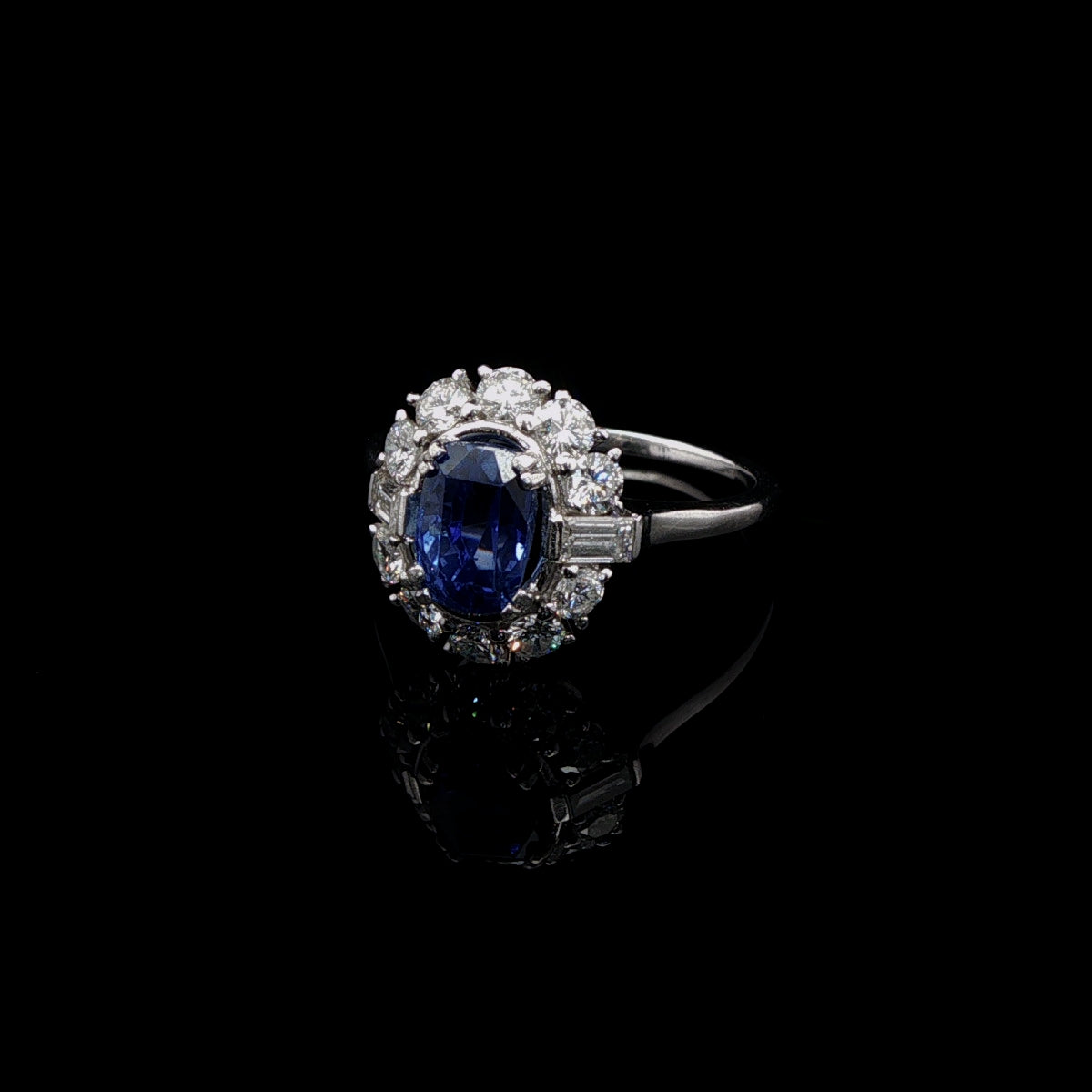 Vintage Platinum 0.50ct Sapphire and 0.60ct Diamond Cluster Ring