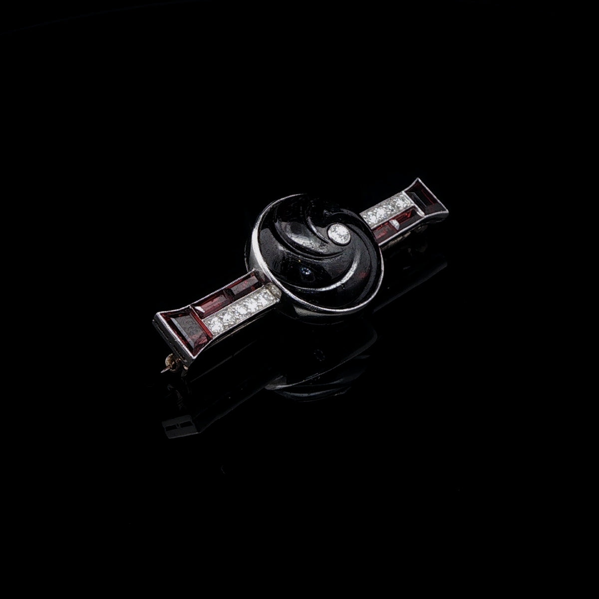 Art Deco Carved Garnet, Old Cut Diamond and Platinum Brooch, Circa 1935