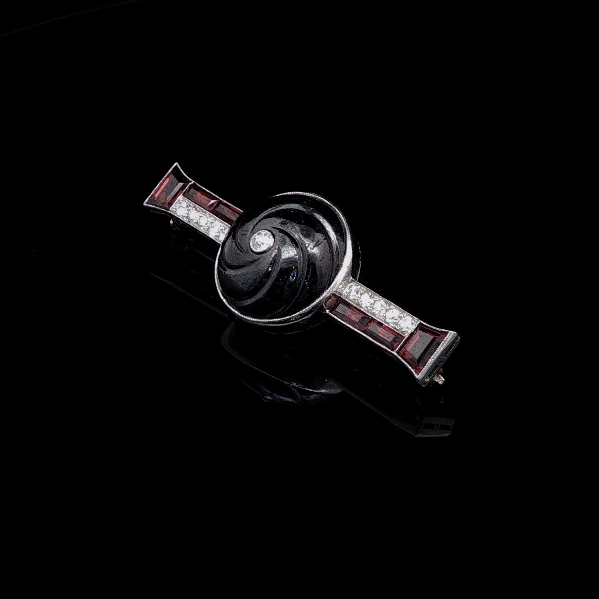 Art Deco Carved Garnet, Old Cut Diamond and Platinum Brooch, Circa 1935