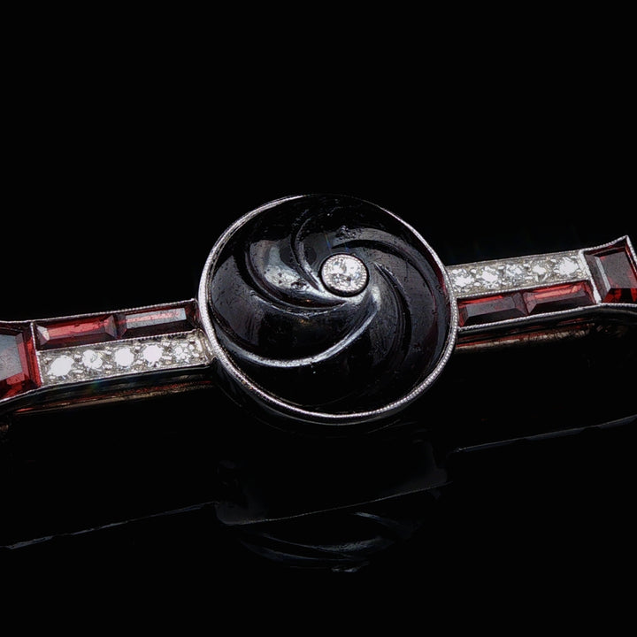 Art Deco Carved Garnet, Old Cut Diamond and Platinum Brooch, Circa 1935