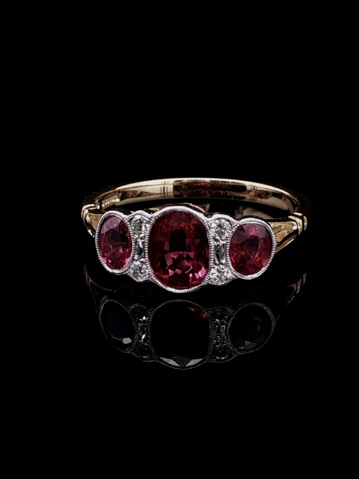 18ct Gold and Platinum Seven Stone 1.43ct Ruby and Old Cut Diamond Ring
