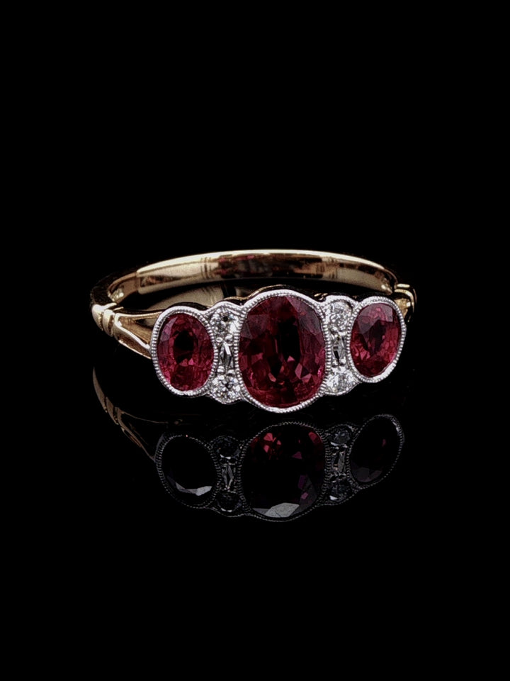 18ct Gold and Platinum Seven Stone 1.43ct Ruby and Old Cut Diamond Ring