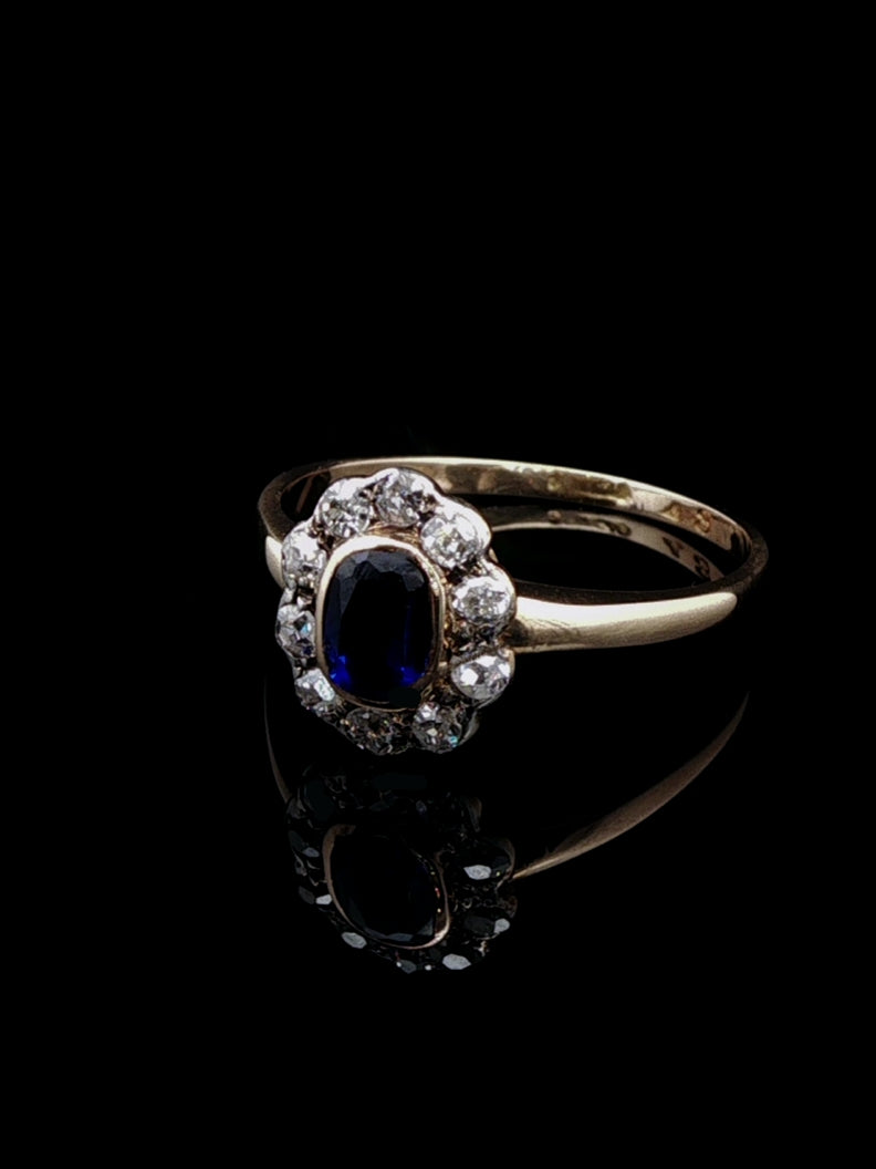 Art Deco 18ct Gold Sapphire and 0.40ct Diamond Cluster Ring, Circa 1930