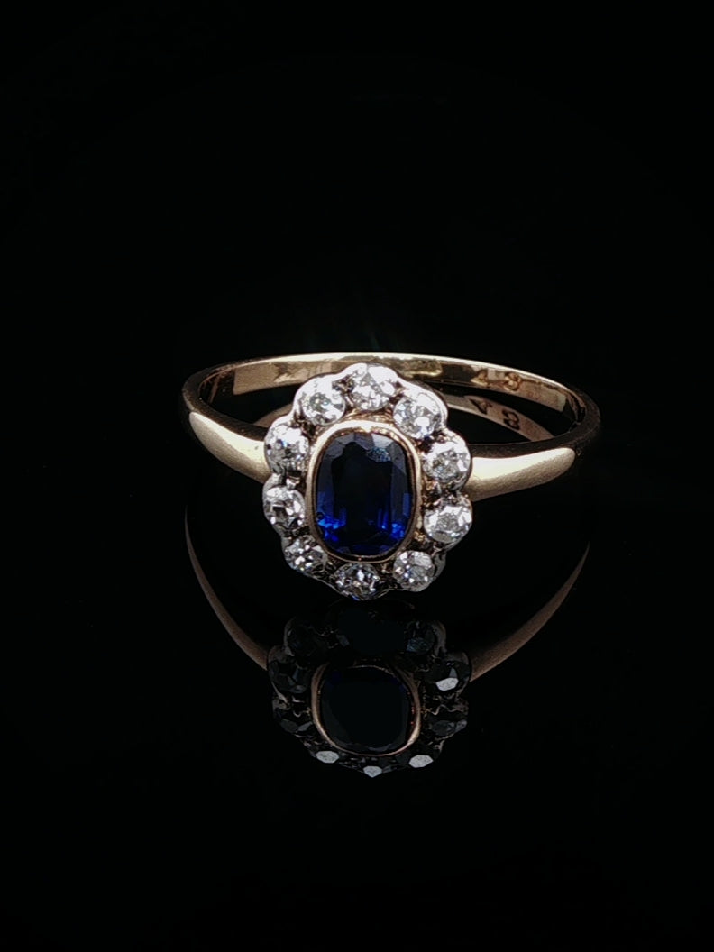 Art Deco 18ct Gold Sapphire and 0.40ct Diamond Cluster Ring, Circa 1930