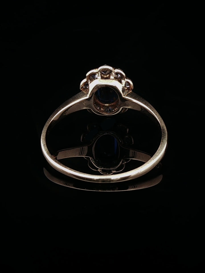 Art Deco 18ct Gold Sapphire and 0.40ct Diamond Cluster Ring, Circa 1930