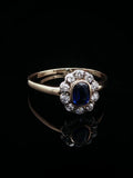 Art Deco 18ct Gold Sapphire and 0.40ct Diamond Cluster Ring, Circa 1930