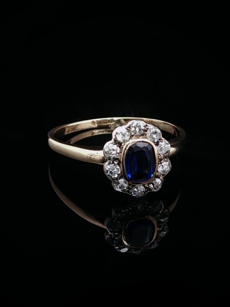 Art Deco 18ct Gold Sapphire and 0.40ct Diamond Cluster Ring, Circa 1930