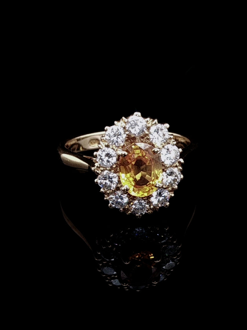 18ct Gold 0.95ct Yellow Sapphire and Brillinat Cut 0.66ct Diamond Cluster Ring, London 1988