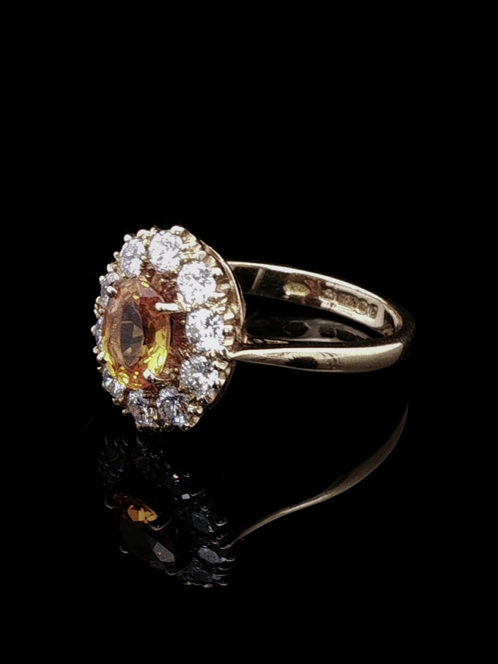 18ct Gold 0.95ct Yellow Sapphire and Brillinat Cut 0.66ct Diamond Cluster Ring, London 1988