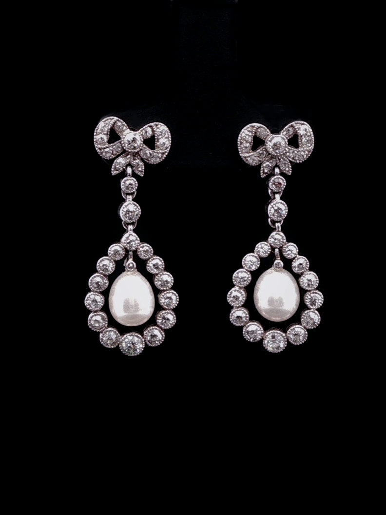 Antique Edwardian 1.00ct Diamond and Pearl Drop Earrings set in Platinum, Circa 1905