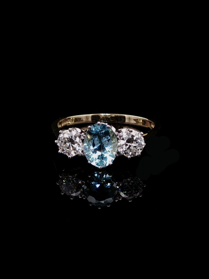 18ct Gold and Platinum 0.93ct Aquamarine and 0.75ct Old Cut Diamond Three Stone Ring