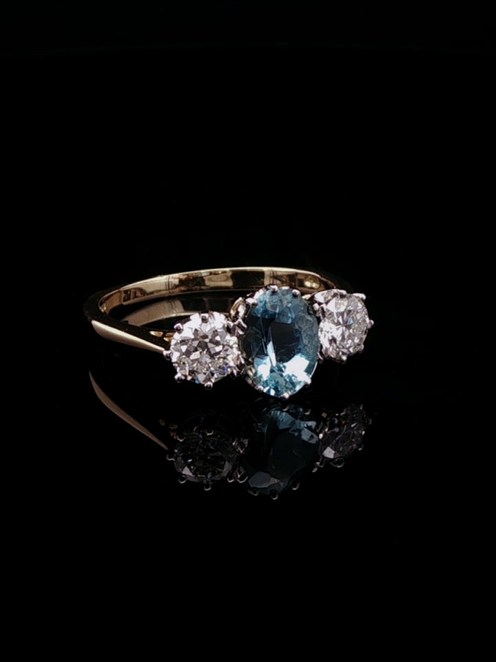 18ct Gold and Platinum 0.93ct Aquamarine and 0.75ct Old Cut Diamond Three Stone Ring