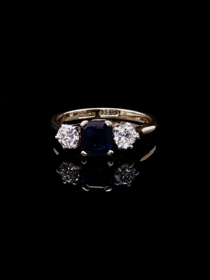 18ct Gold and Platinum 0.77ct Square Cut Sapphire and 0.40ct Diamond Three Stone Ring