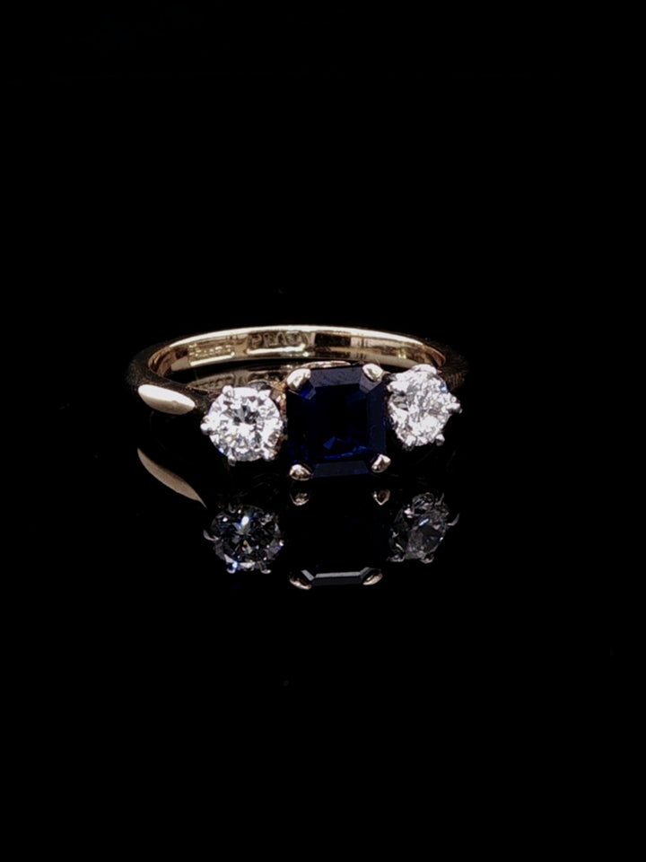 18ct Gold and Platinum 0.77ct Square Cut Sapphire and 0.40ct Diamond Three Stone Ring