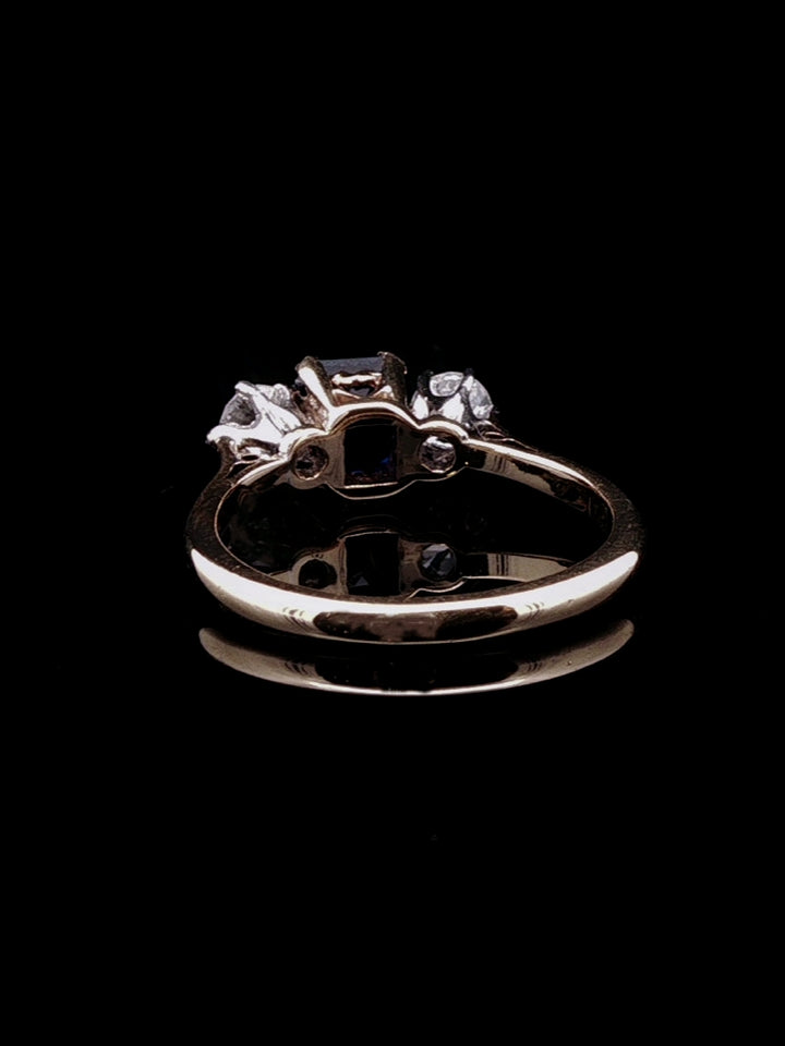 18ct Gold and Platinum 0.77ct Square Cut Sapphire and 0.40ct Diamond Three Stone Ring