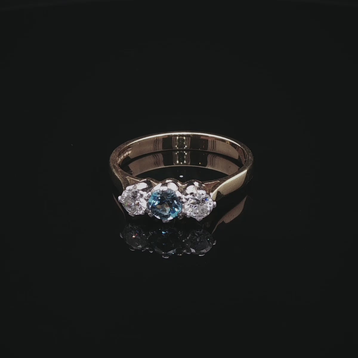 18ct Gold 0.30ct Diamond and Aquamarine Three Stone Ring,London 1989