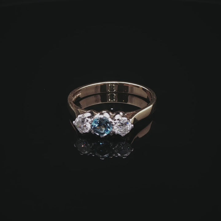 18ct Gold 0.30ct Diamond and Aquamarine Three Stone Ring,London 1989