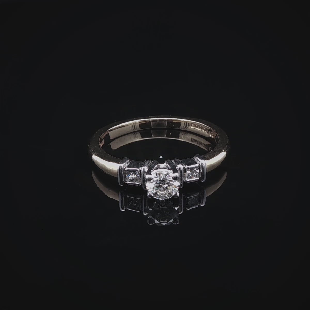 18ct Gold Three Stone Brilliant and Princess cut Diamond Ring