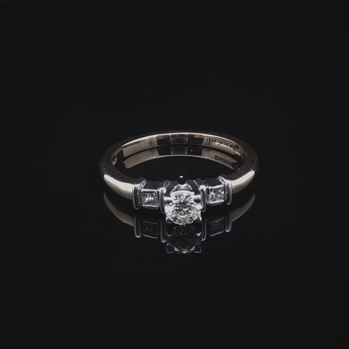 18ct Gold Three Stone Brilliant and Princess cut Diamond Ring